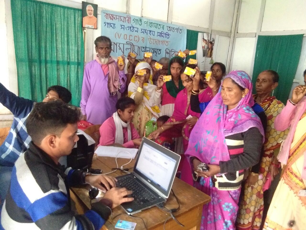 Distribution of health cards under Atal Amrith Abhiyan in Assam